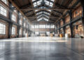 Industriehalle des Areal Böhler mit Stahlträgern und Backsteinwänden